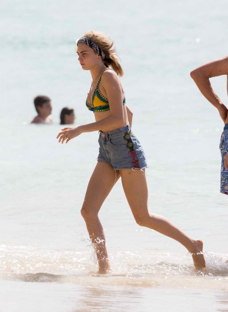 Cara Delevingne in Bikini Top at the Beach in Barbados 12/29/2015-4