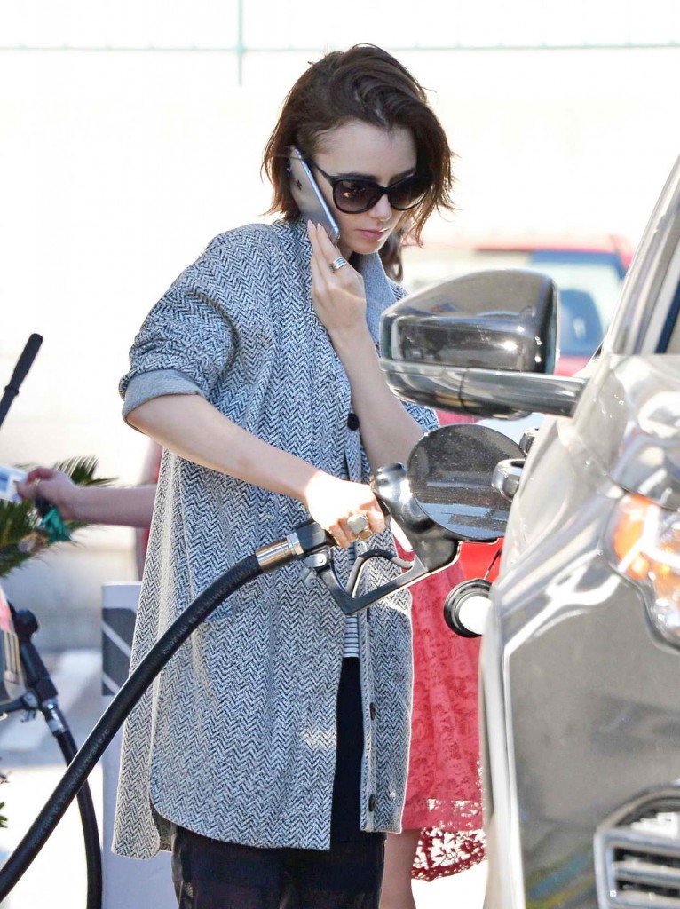 Lily Collins Getting Gas in Los Angeles 03/08/2016-1
