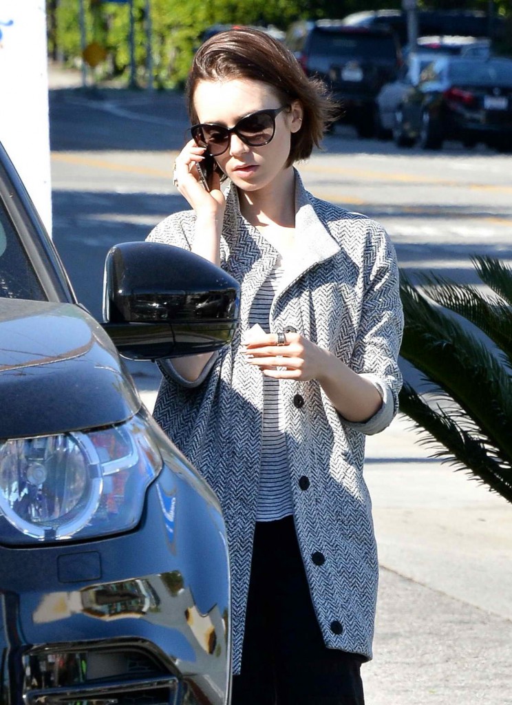 Lily Collins Getting Gas in Los Angeles 03/08/2016-2