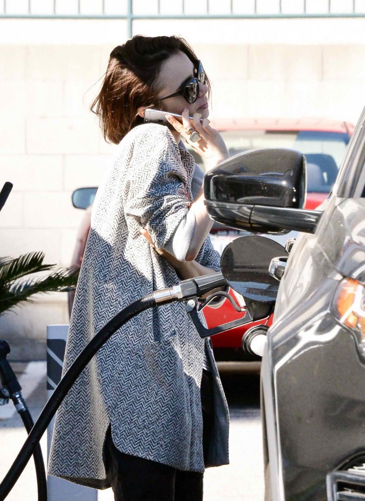 Lily Collins Getting Gas in Los Angeles 03/08/2016-3