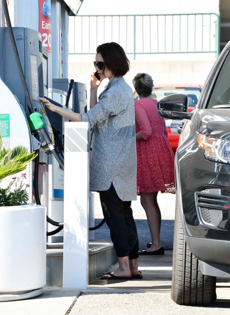 Lily Collins Getting Gas in Los Angeles 03/08/2016-4