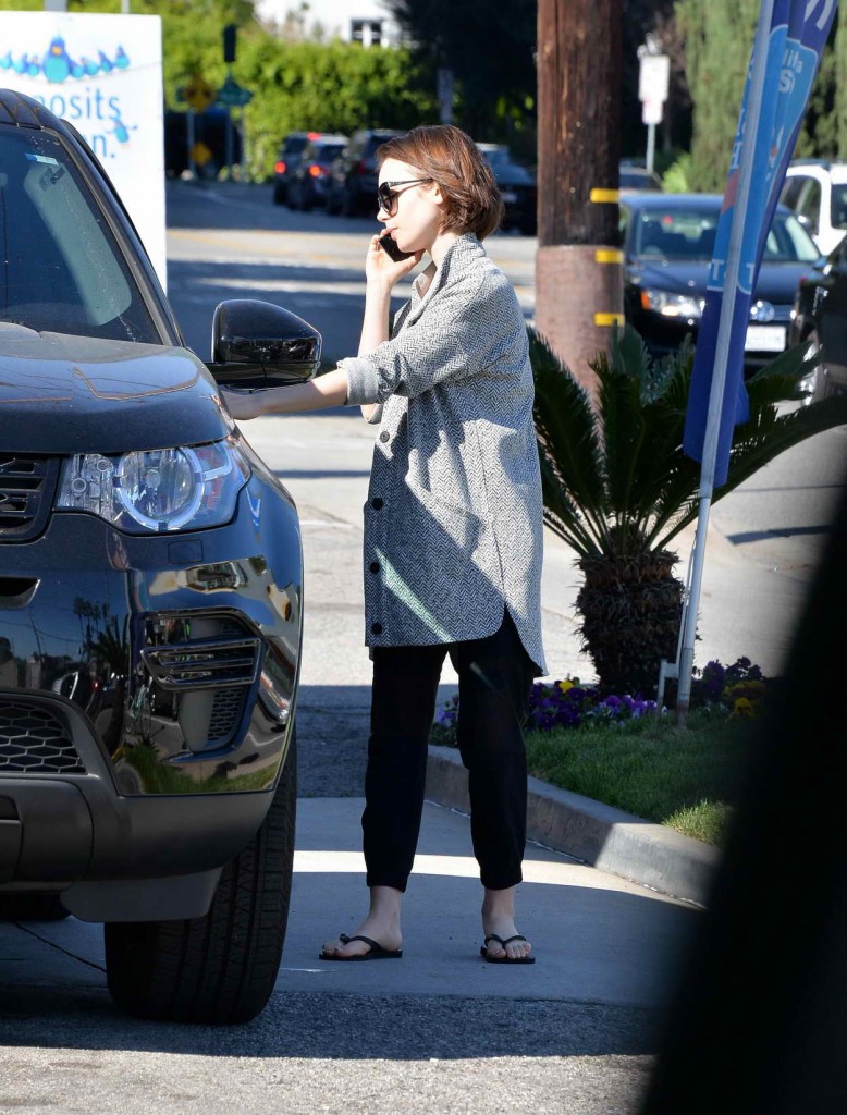Lily Collins Getting Gas in Los Angeles 03/08/2016-5