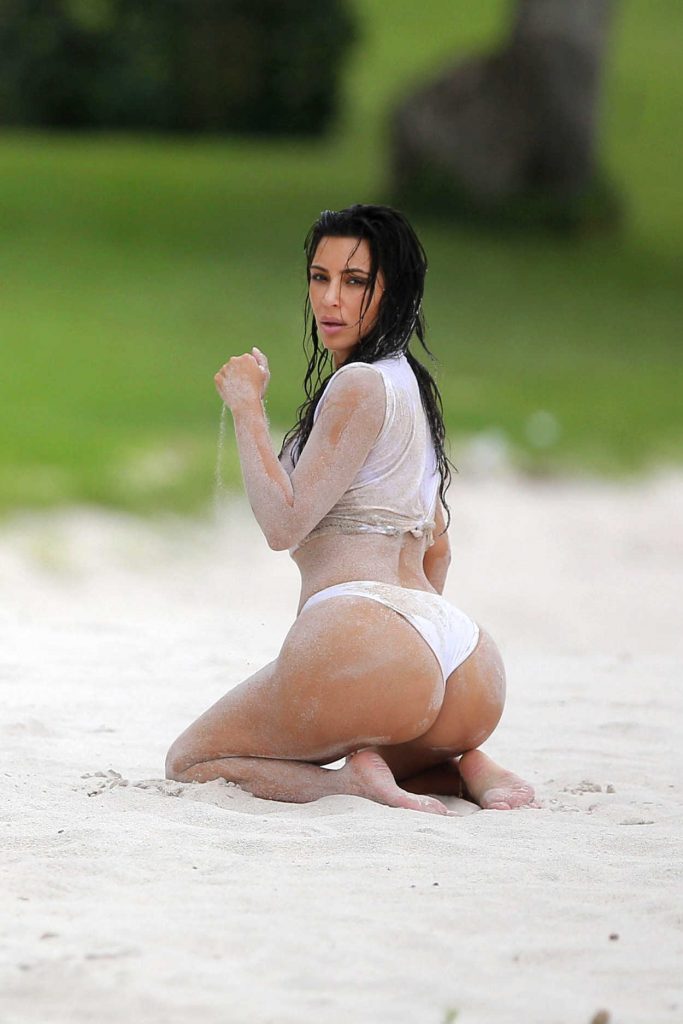 Kim Kardashian Wearing a White One-Piece in Punta Minta, Mexico 08/20/2016-2