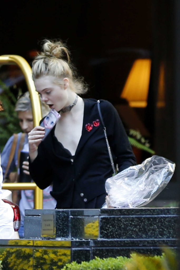 Elle Fanning Goes Shopping in New Orleans 10/29/2016-2