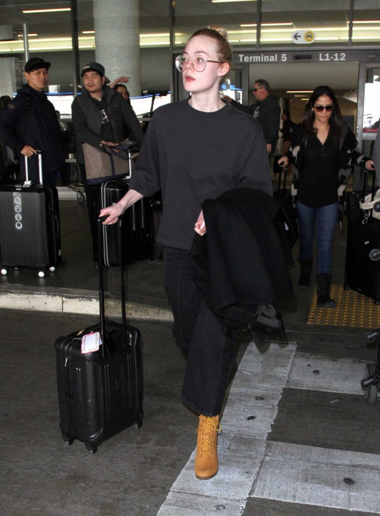 Elle Fanning Arrives at LAX Airport in Los Angeles 01/26/2017-2