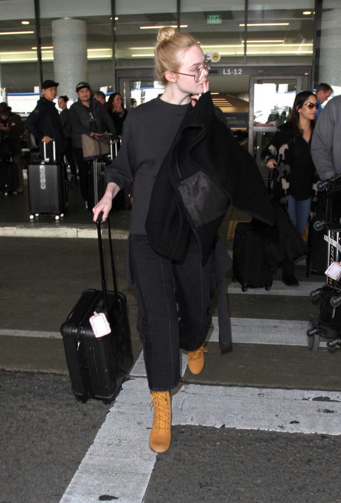 Elle Fanning Arrives at LAX Airport in Los Angeles 01/26/2017-3