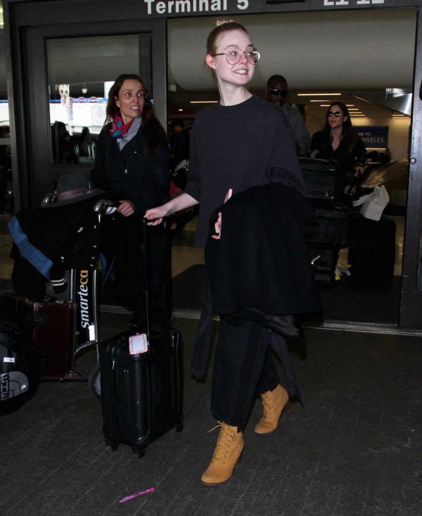 Elle Fanning Arrives at LAX Airport in Los Angeles 01/26/2017-4