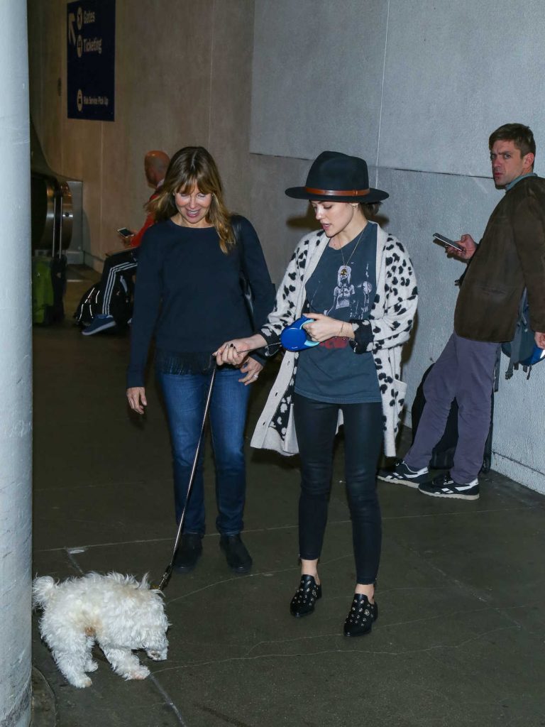 Lucy Hale at LAX Airport in Los Angeles 01/01/2017-2