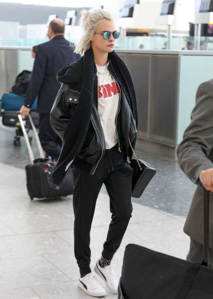 Cara Delevingne Arrives at Heathrow Airport in London 03/26/2017-3