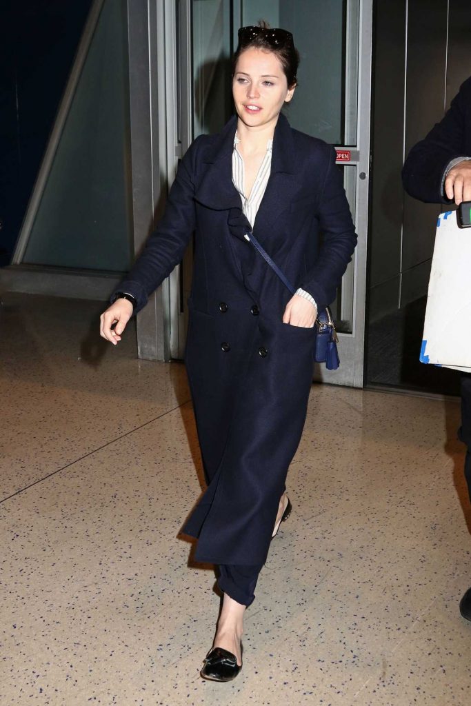 Felicity Jones Arrives at JFK Airport in New York 02/27/2017-4