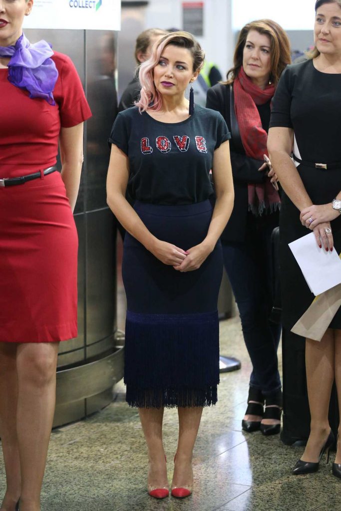 The 45-year-old Award-winning singer, actress, and reality TV star Dannii Minogue, who sang hit songs like "Love and Kisses" and "Jump to the Beat", attends a media call for Virgin Australia at Melbourne Airport.-2
