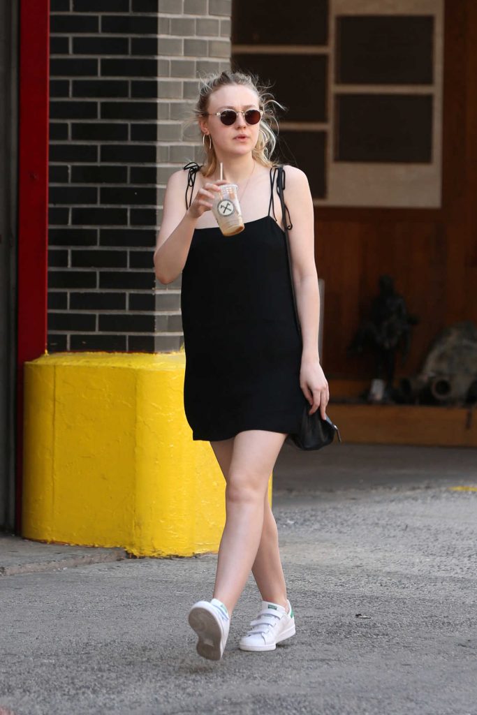 Dakota Fanning Sips on Her Iced Coffee in New York City 05/19/2017-3