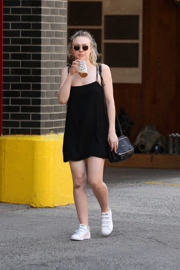 Dakota Fanning Sips on Her Iced Coffee in New York City 05/19/2017-4