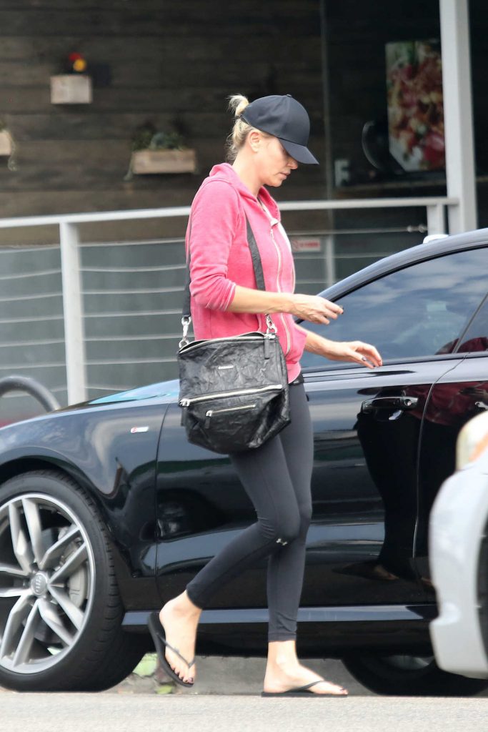 Charlize Theron Wears a Black Under Armour Leggings Out in Los Angeles 07/25/2017-2