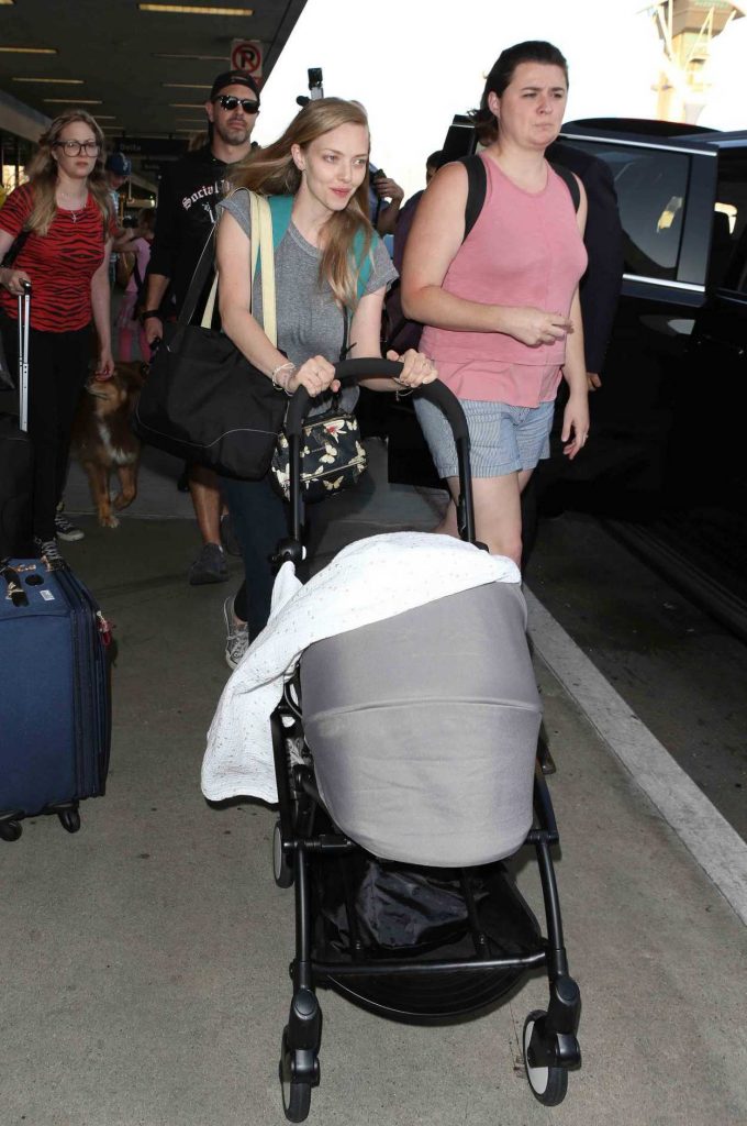 Amanda Seyfried Arrives at LAX Airport in LA With Her Husband Thomas Sadoski 08/22/2017-3