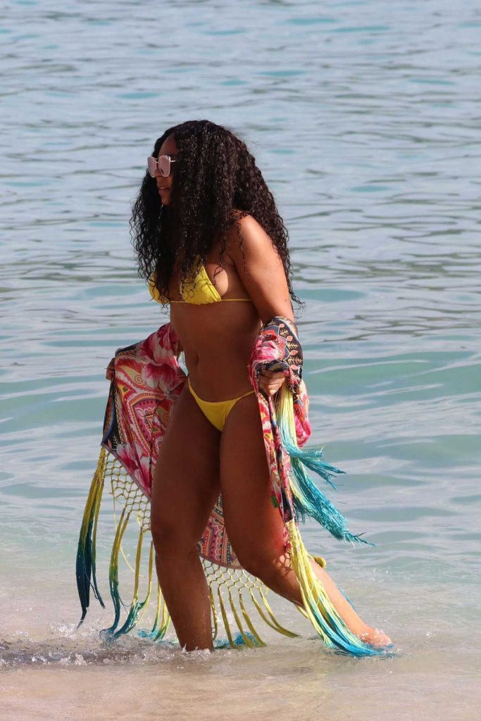 Ashanti Wears a Yellow Bikini at the Beach in Hawaii 11/21/2017-4