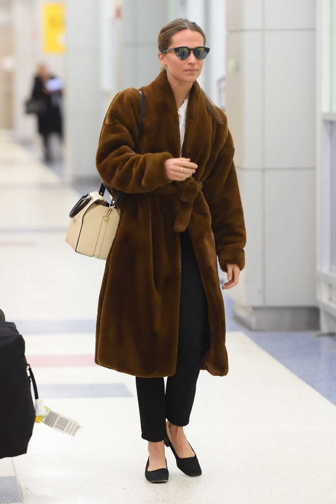 Alicia Vikander Arrives at JFK Airport in NYC 02/20/2018-3