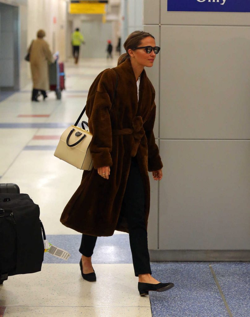 Alicia Vikander Arrives at JFK Airport in NYC 02/20/2018-4