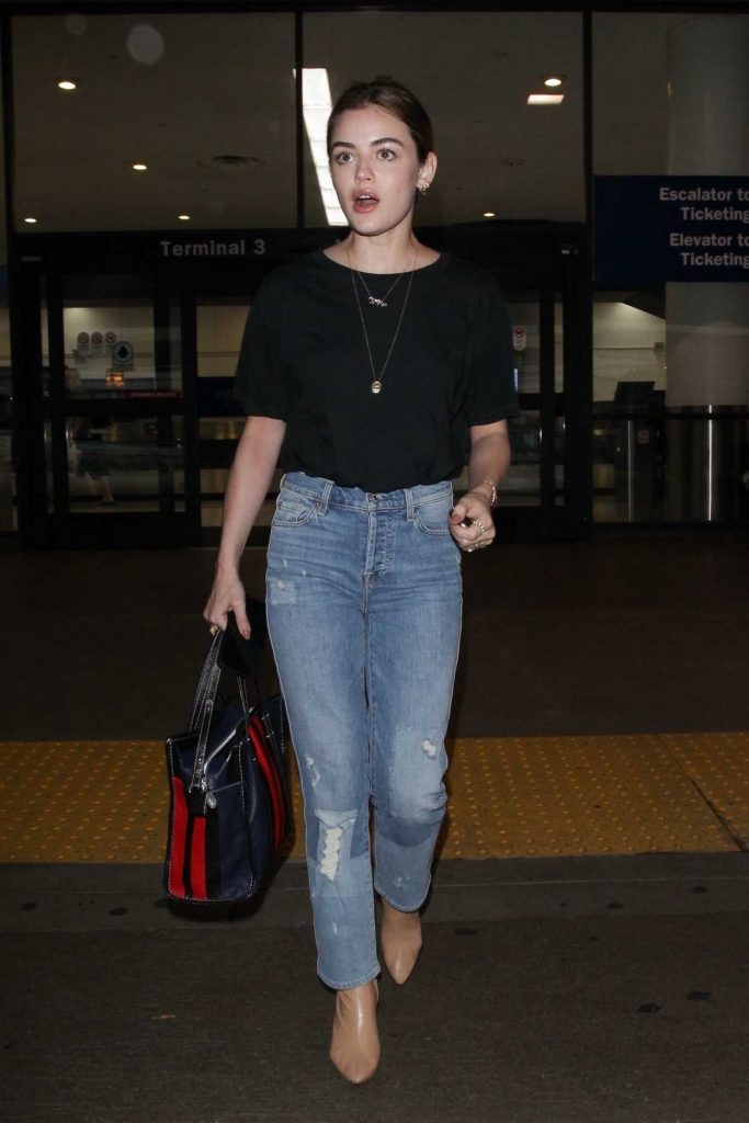 Lucy Hale Wears a Blue Jeans as She Arrives at LAX Airport in LA 04/19/2018-1
