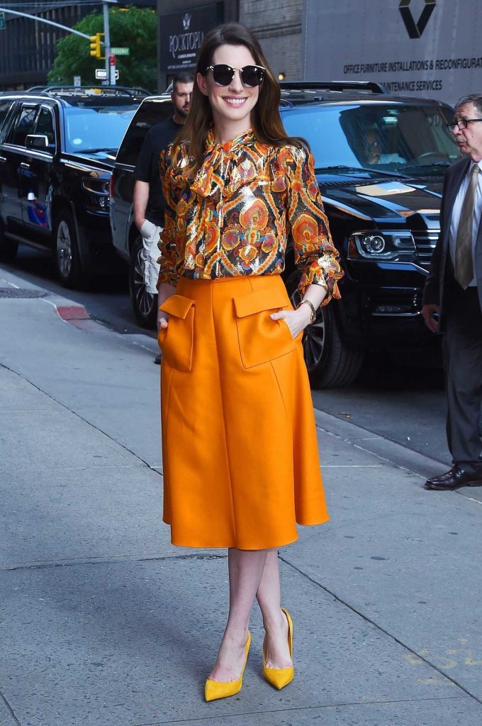 Anne Hathaway Leaves Her Hotel in a Bright Orange Skirt in New York 05/24/2018-4