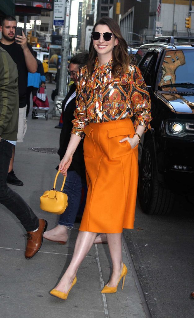 Anne Hathaway Leaves Her Hotel in a Bright Orange Skirt in New York 05/24/2018-5