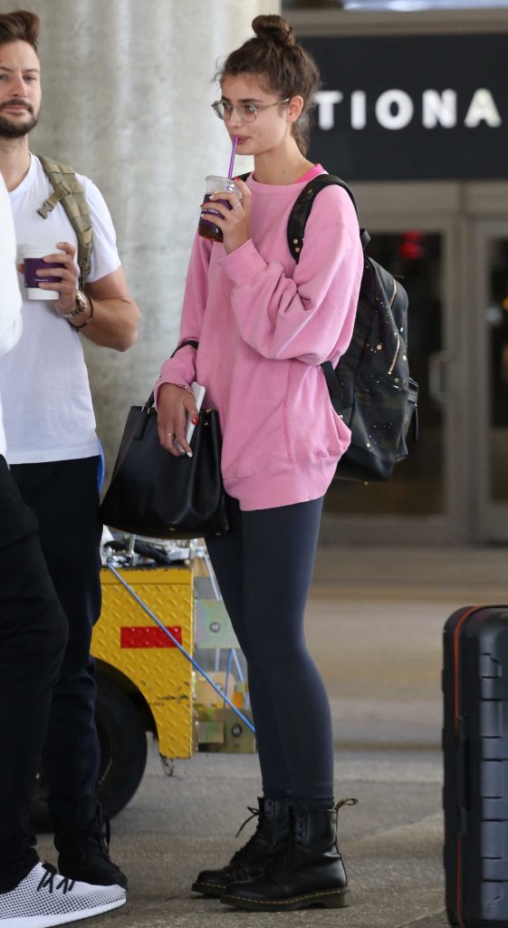 Taylor Hill Wears a Pink Long Sleeve Sweatshirt at LAX Airport in LA 05/17/2018-5