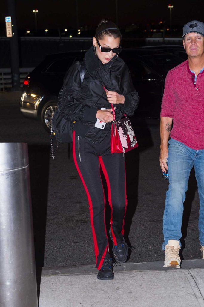 Bella Hadid Wears a Prada Handbag at JFK Airport in New York 06/14/2018-1