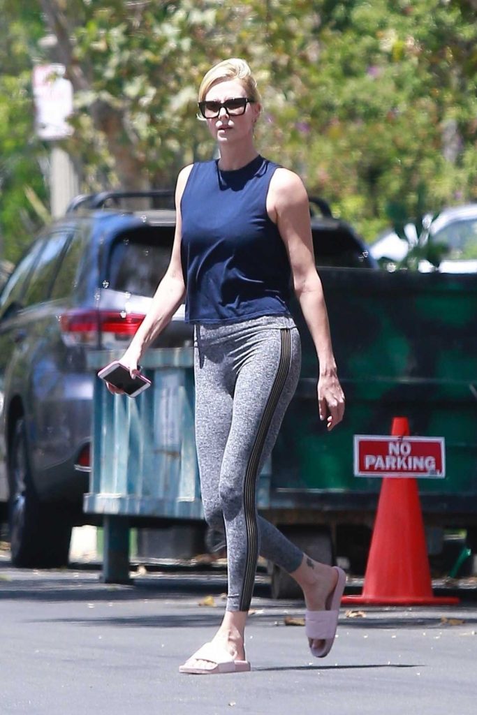 Charlize Theron Wears a Gray Sports Pants Out in Los Angeles 07/14/2018-1