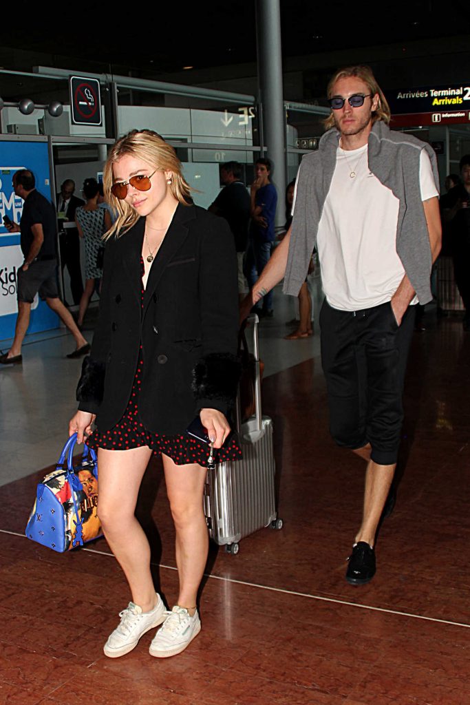 Chloe Moretz Arrives with Her Brother Trevor at Charles de Gaulle Airport in Paris 06/30/2018-2