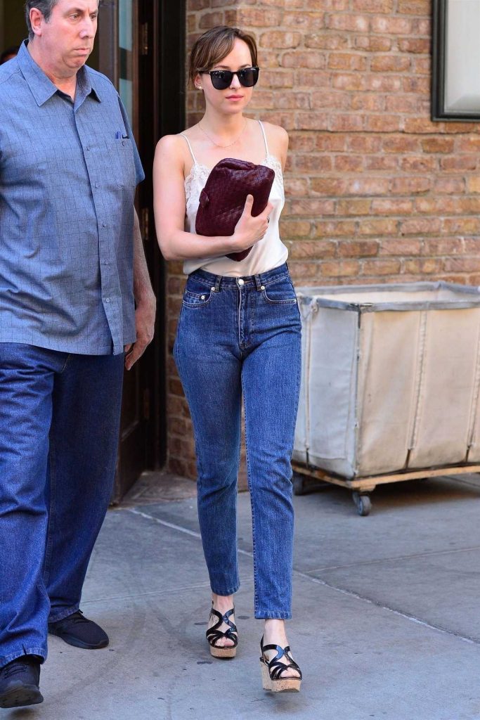 Dakota Johnson Wears a White Lace Blouse Out in New York 07/19/2018-2