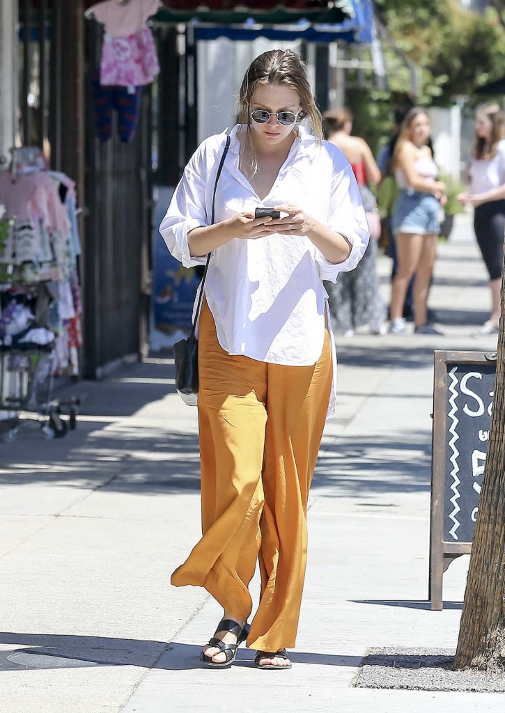Elizabeth Olsen in a Goldenrod Wide Pants