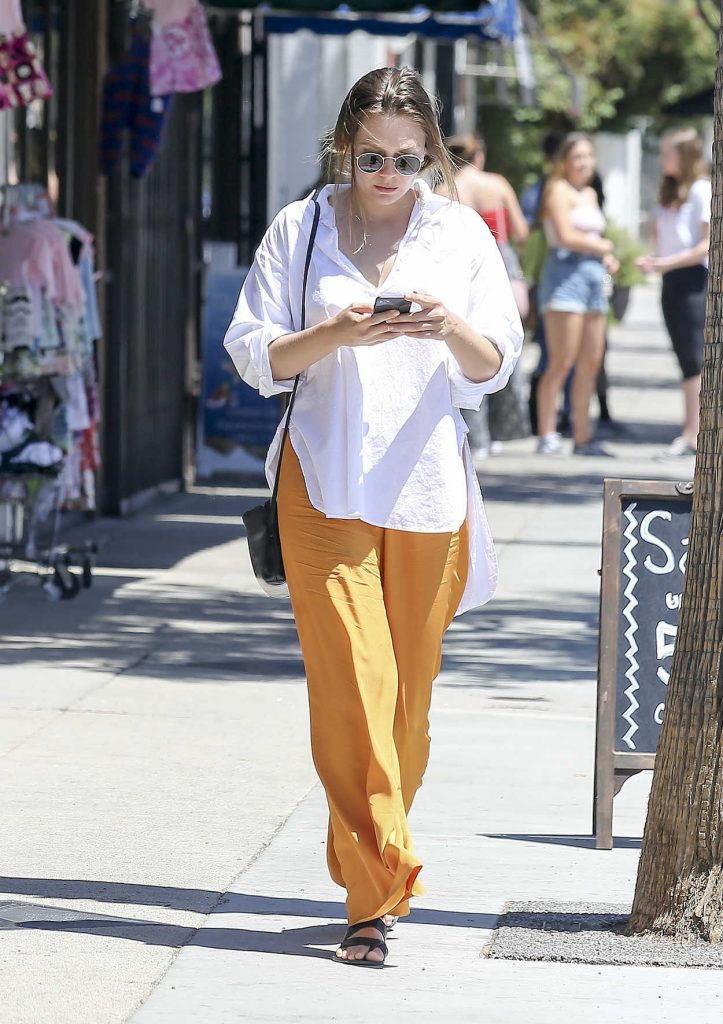 Elizabeth Olsen in a Goldenrod Wide Pants
