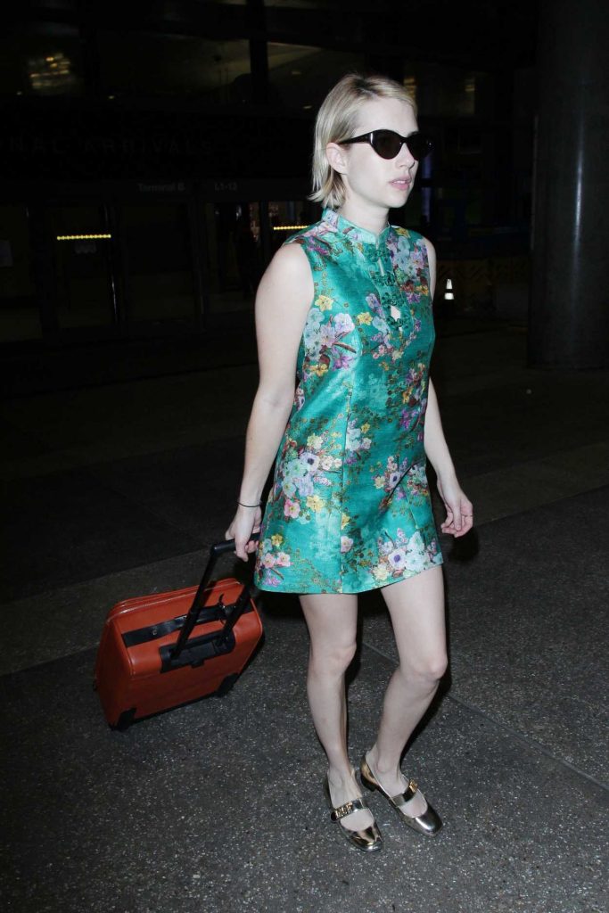 Emma Roberts Wears a Green Chinese Style Dress at LAX Airport in Los Angeles 07/03/2018-5