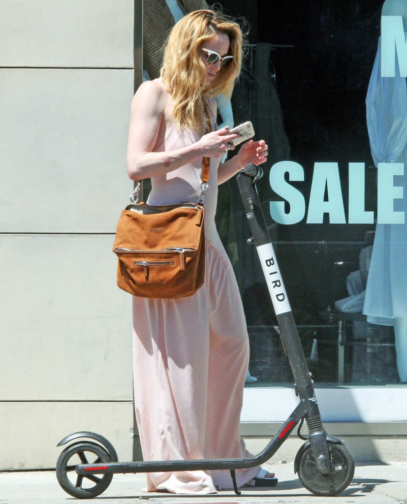 Caity Lotz in a Beige Summer Overalls