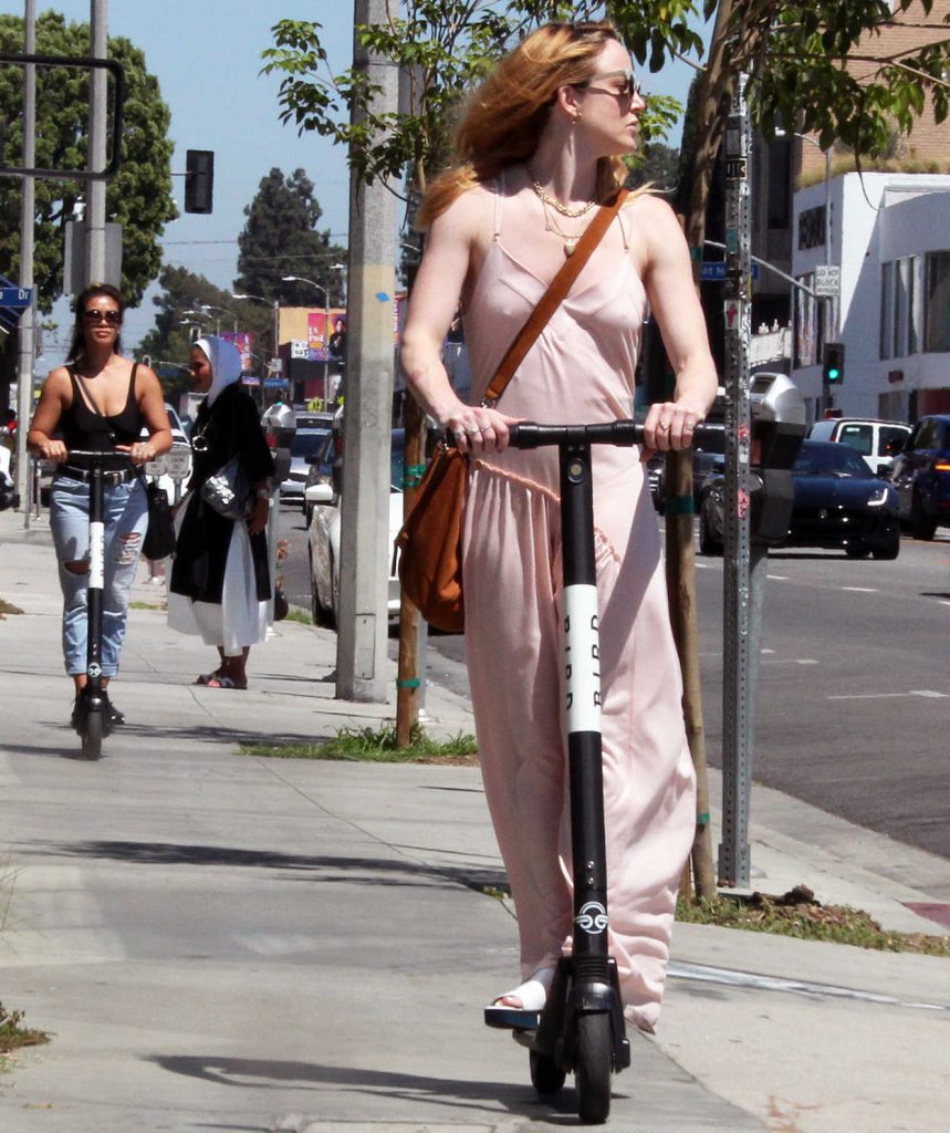 Caity Lotz in a Beige Summer Overalls