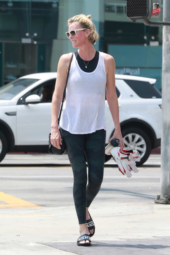 Charlize Theron in a Military Leggings
