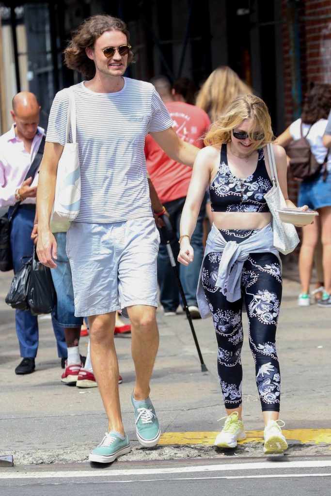 Dakota Fanning in a Black Floral Workout Clothes
