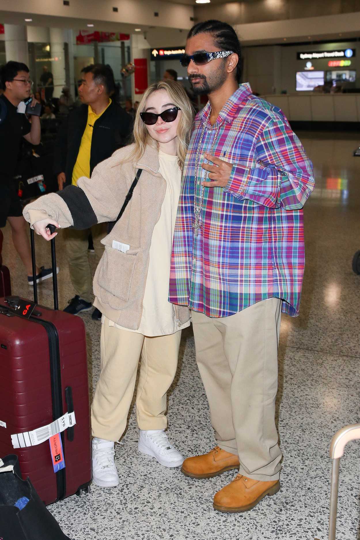 Sabrina Carpenter Touches Down at Kingsford Smith Airport in Sydney 08