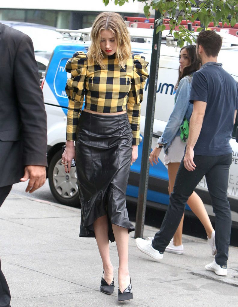 Amber Heard in a Black-Yellow Plaid Blouse