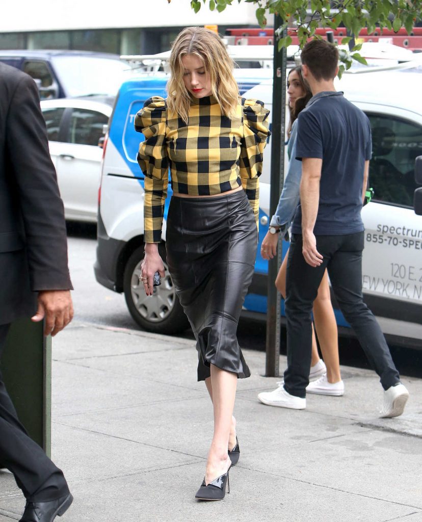 Amber Heard in a Black-Yellow Plaid Blouse