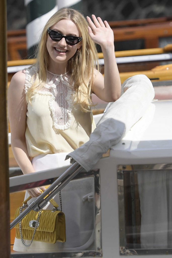 Dakota Fanning in a Yellow Embroidered Blouse
