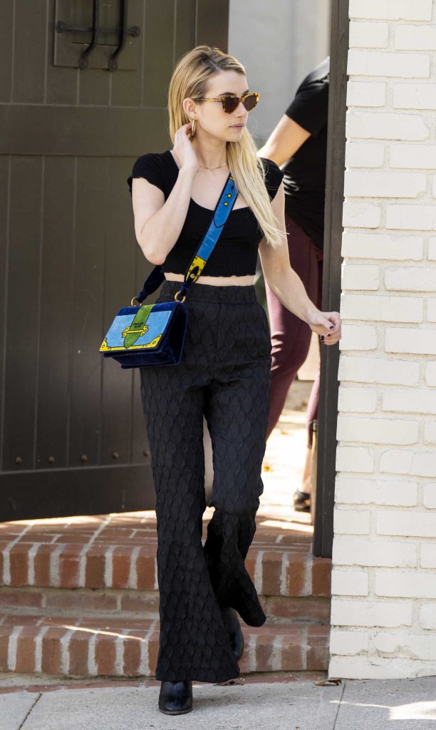 Emma Roberts in a Black Cropped Top