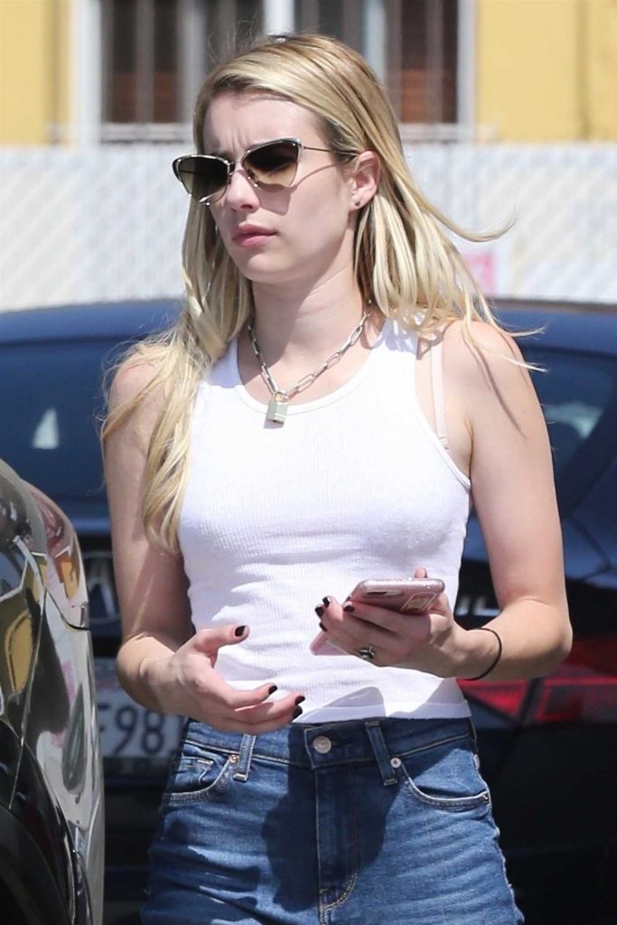 Emma Roberts in a White Tank Top