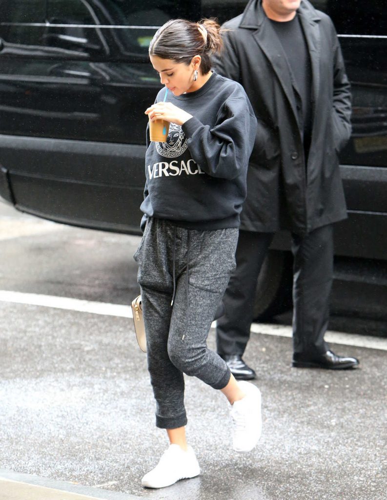 Selena Gomez in a Black Versace Sweatshirt