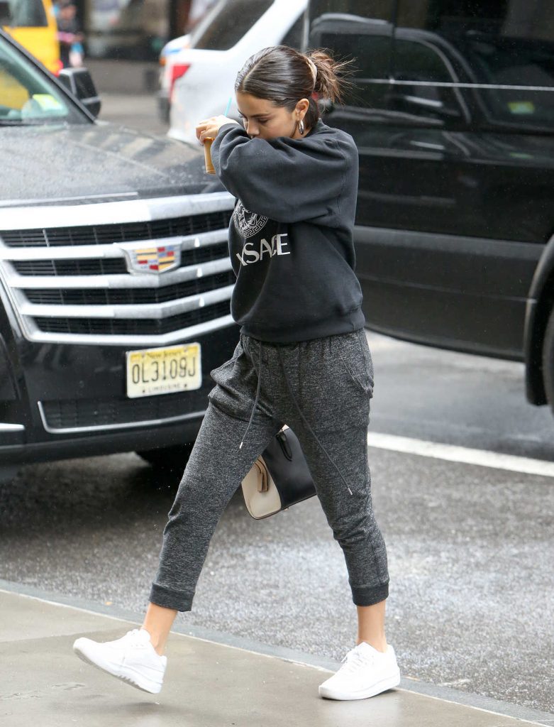 Selena Gomez in a Black Versace Sweatshirt