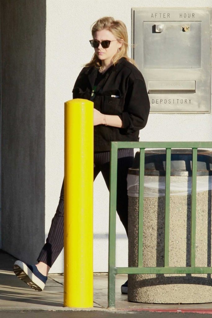 Chloe Moretz in a Black Denim Jacket
