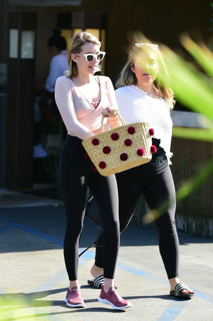 Emma Roberts in a Pink Blouse
