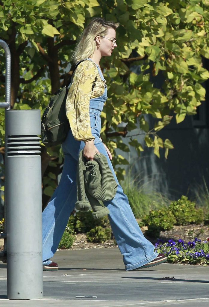 Margot Robbie in a Yellow Floral Blouse