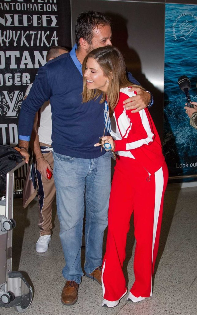 Maria Menounos in a Red Tracksuit
