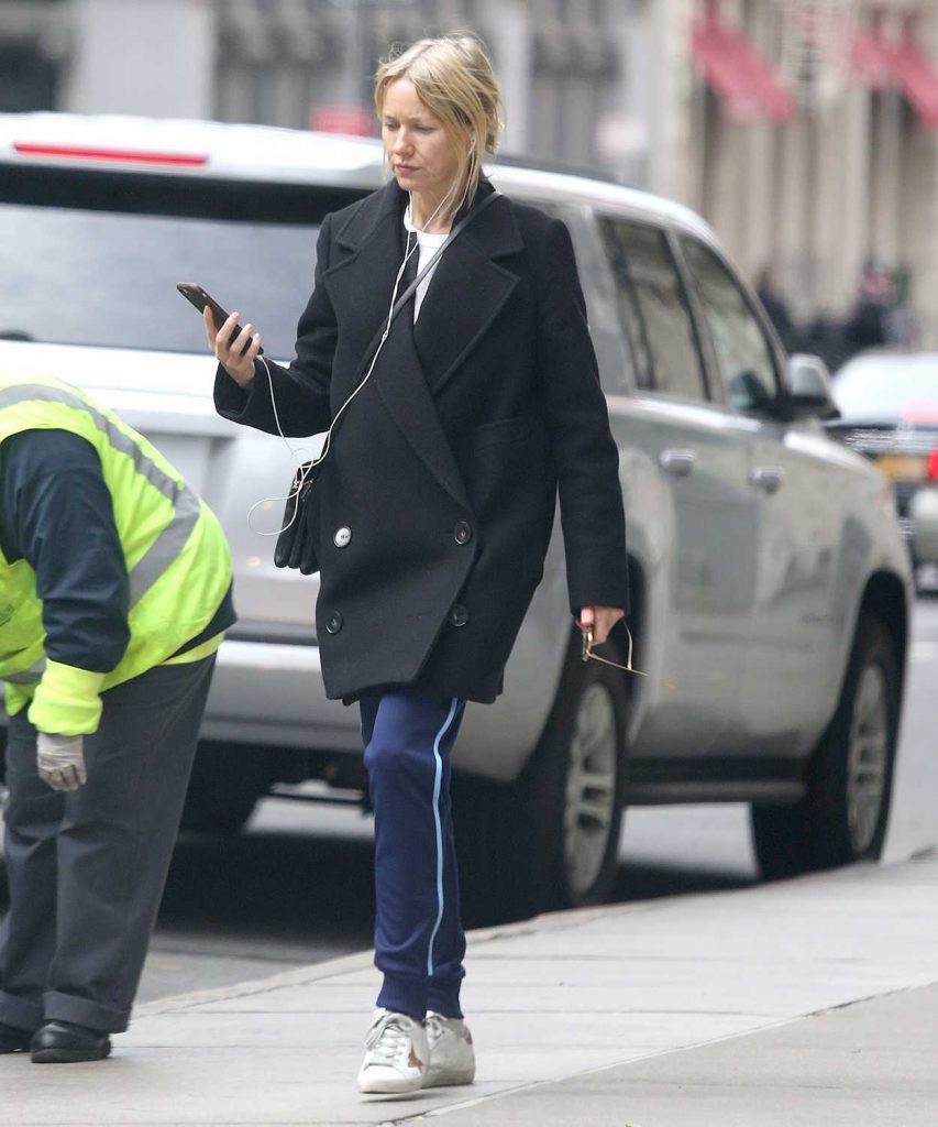 Naomi Watts in a Black Coat